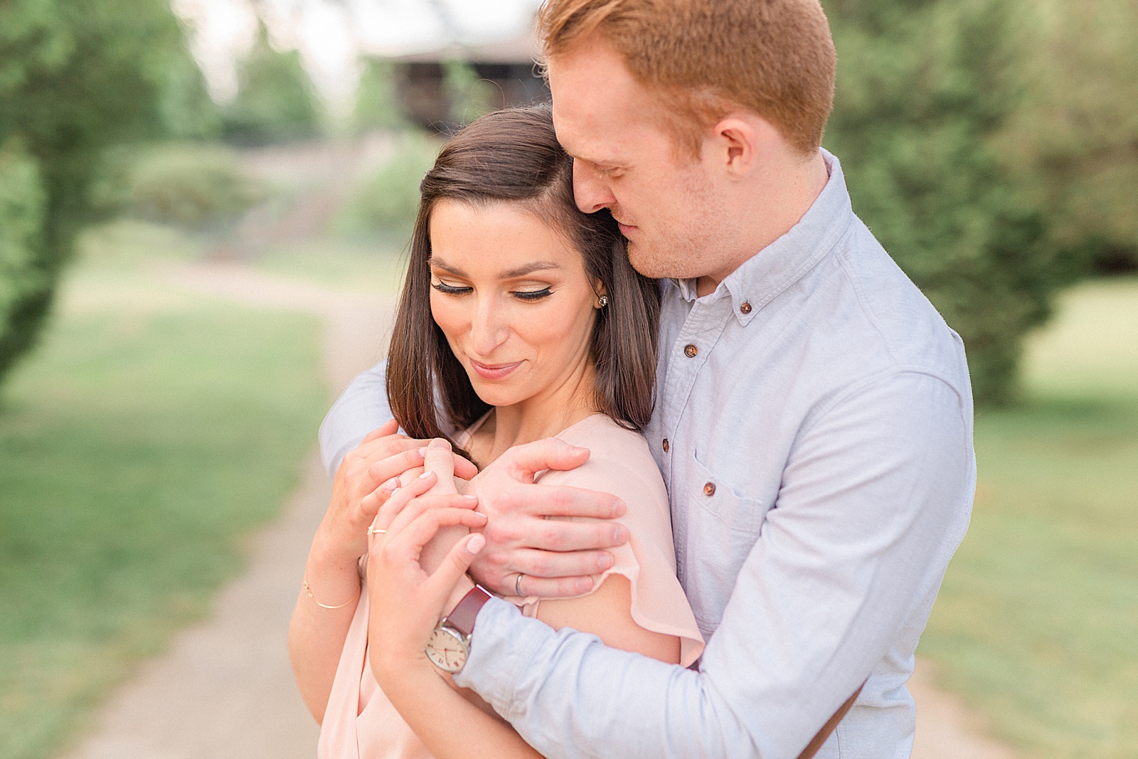Couple hugging at engagement session in Rockwood