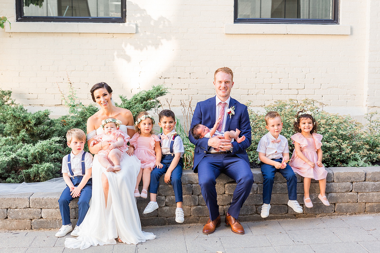 Bride and Groom with flower girls and ring bearers